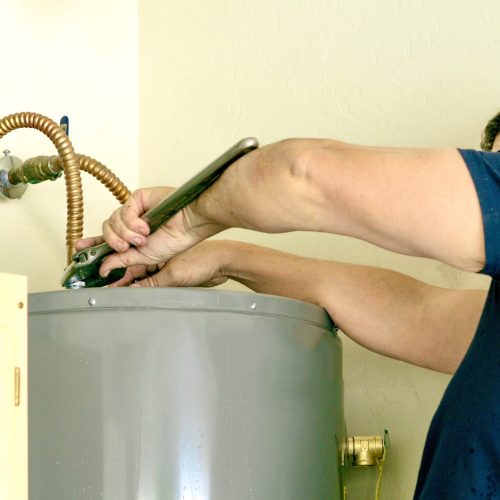 adult-male-using-a-wrench-to-make-adjustments-on-t-2026-01-07-00-39-59-utc